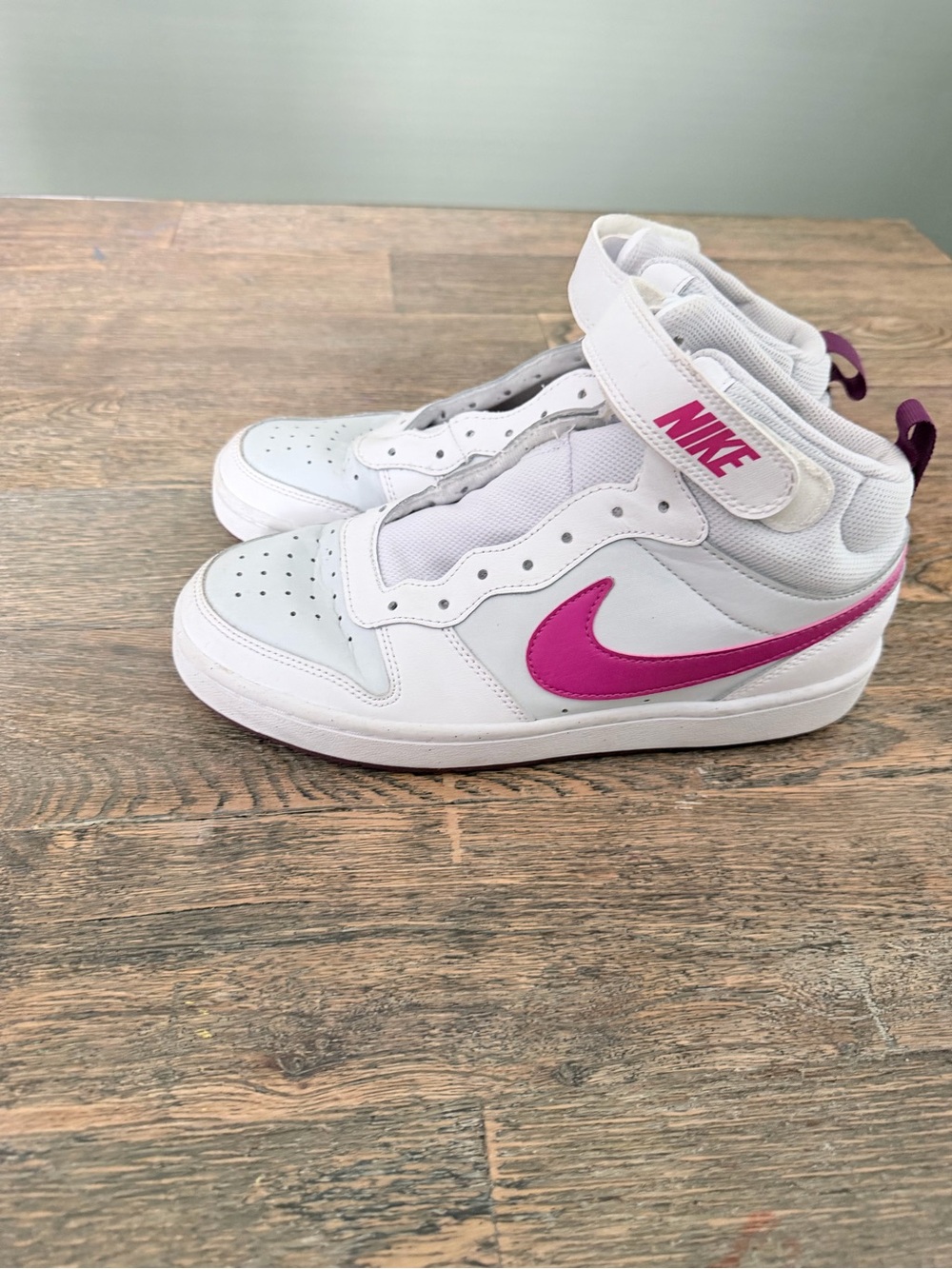 Nike White High-Top Sneakers with Magenta Swoosh